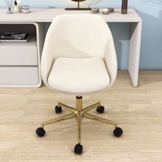 a white desk chair sitting in front of a computer desk with a clock on it