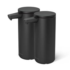 two black canisters sitting next to each other