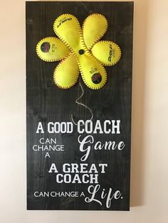 a good coach game is a great coach's life painted on a wood sign