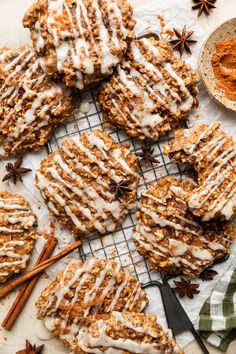 cookies with icing and cinnamon on a cooling rack