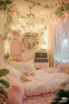 a bedroom decorated in pink and white with teddy bears on the bed, lights strung from the ceiling