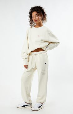 PacSun exclusive! Elevate your loungewear game with the Champion x PAC 1980 Sweatpants, designed for comfort and style. Featuring a high-rise fit with an interior drawstring waistband, side hand pockets, and elastic ankle cuffs, these sweatpants offer a cozy yet tailored look. Complete with a soft-touch PacSun graphic and iconic Champion logo C embroidery, they're the perfect blend of fashion and function for your everyday wardrobe.


	Solid color sweatpants
	High-rise
	Interior drawstring waistband
	Side hand pockets
	Champion C embroidery
	PacSun graphic
	Elastic ankle cuffs
	82% cotton, 18% polyester
	Machine washable
	Model is wearing a size medium
	Model measurements: 5’6” height, 30” bust, 25.5” waist, 36.5” hip