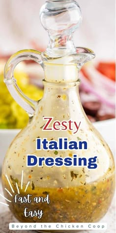 a glass bottle filled with italian dressing on top of a table