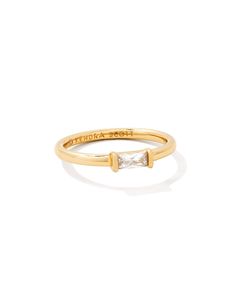 Simple, sophisticated, and smart. Our Juliette Gold Band Ring in White Crystal is a charming addition to your formal collection. On any outing, this timeless ring will ensure that you sparkle from head to hand.Ring Size: 7Other sizes available via special order. Gold Rings Kendra Scott, Kendra Scott Juliette, Gold Kendra Scott Ring, Simple Band Rings Women, Kendra Scott Ring Gold, Kendra Scott Rings, Push Ring, Kendra Scott Ring, Bday List