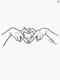 two hands are holding each other in the shape of a heart with words written on it