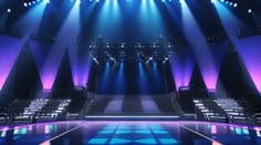 an empty stage with rows of seats and spotlights on the ceiling is lit by blue lights