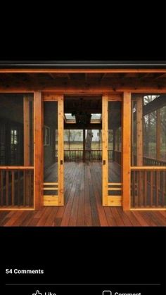 an open wooden door on top of a wooden deck in front of a black background