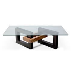 a glass table with two wooden legs