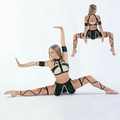 a young woman in black and white outfit doing yoga poses with her arms stretched out