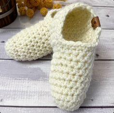 "Keep your toes toasty warm with these thick cozy handmade socks. Crocheted from a bulky soft yarn, they are sure to be the warmest coziest slippers your feet have ever been in.  Slippers are Unisex and are a perfect gift for yourself or someone in your life who needs some extra cozy comfort. They are great for wearing at home or for packing in your bag to bring along when visiting friends or family.  These bulky indoor socks are super stretchy and won't cause constriction of your feet but will keep their shape as well.    ITEM DETAILS:   * Handmade with a soft bulky acrylic yarn which is a great option to wool slipper * Available in 20 colours  * Option of 4 different size  * Handcrafted in a hygienic enviorment at my cozy farm in small town Saskatchewan  * Fully washable for easy care * Cozy Closed Toe Slippers, Cozy Knitted Yarn Slippers, Cozy Yarn Slippers With Round Toe, Cozy Crochet Slippers For Winter, Knit Slipper Socks, Easy Crochet Slippers, Cozy Slippers, Handmade Socks, Soft Slippers