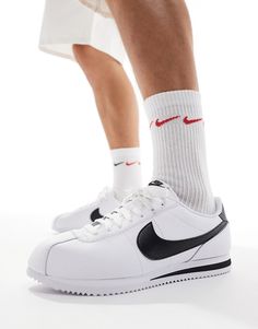 Sneakers by Nike Casual cool: perfected Low-profile design Lace-up fastening Padded tongue and cuff Signature Nike branding Durable rubber outsole Textured grip tread White Nike Cortez Outfit Men, Nike Cortez High Top, Nike Cortez Shoes Men, Nike Cortez Black, Nike Cortez Shoes, Cortez Shoes, Nike Cortez Leather, Nike Classic Cortez Leather, 10.5 Mens Nike Cortez Shoes