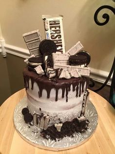 a chocolate covered cake sitting on top of a table