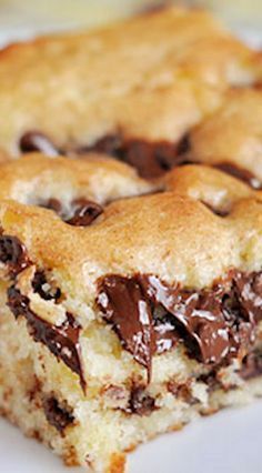 two pieces of chocolate chip cookie cake on a plate