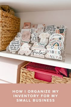 a shelf filled with lots of different types of cards and magnets on top of it