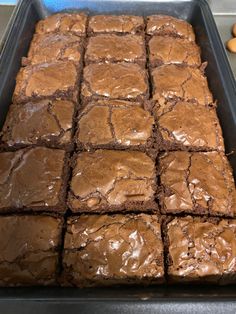 chocolate brownies in a baking pan on a counter