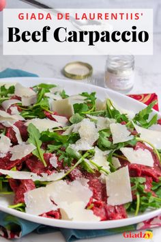 White oval plate with arugula, parmesan cheese and thinly sliced beef. Cold Beef Appetizers, Vegetable Carpaccio, Steak Carpaccio, Yellowtail Carpaccio, Wine Appetizers