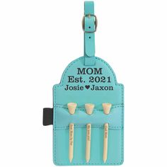 a luggage tag with three cups on it and the words mom estt, 2021