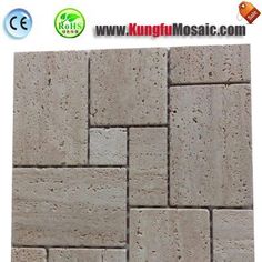 a close up view of a wall made out of concrete blocks with the words king mosaic com on it