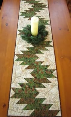 a table runner with a candle on it