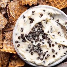 chocolate chip ice cream in a bowl surrounded by waffles and graham crackers