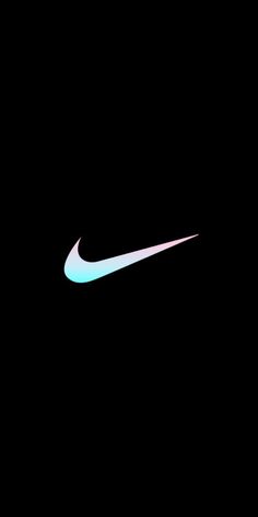 the nike logo is glowing in the dark