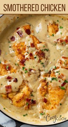 chicken with gravy in a skillet on top of a white countertop