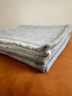 two blankets folded on top of each other