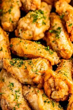 chicken wings with herbs and seasoning in a pan