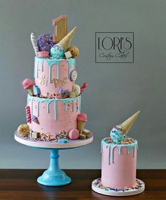 two cakes decorated with ice cream, sprinkles and candies