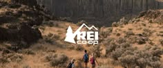 three people are walking through the desert with mountains in the background and text reading reicoop