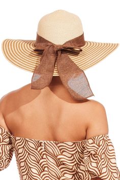 This brown and natural beige braided sun hat with bow adds instant style and functionality to your warm weather look! Floppy Straw Hat, Wide Brimmed, Straw Hat, Sun Hats, Warm Weather, Floppy Hat, Straw, Braids, Hats