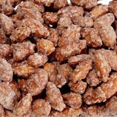 a pile of nuts sitting on top of a white table