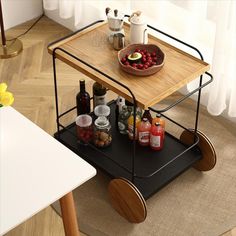 a table with drinks and condiments on it in a living room or dining room