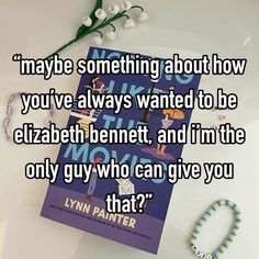 a book sitting on top of a white table next to a flower and bracelet with the words maybe something about how you've always wanted to be elizabeth bennet