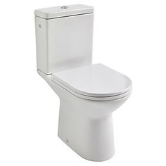 a white toilet sitting on top of a white floor