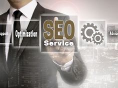 a man in a business suit is touching the word seo on his screen with other words surrounding him