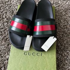 Brand New With Tags Got From Stock X Ordered The Wrong Size I’m A 5 Accidentally Order The Size 6 So It’s Mens Size Classic Black Slides With Rubber Sole, Classic Black Slides With Flat Heel, Classic Black Flat Heel Slides, Classic Black Flat Slides, Gucci Casual Flat Slides, Black Slides With Branded Insole And Flat Heel, Casual Leather Gucci Slides, Classic Black Slides With Branded Insole, Casual Black Gucci Slides