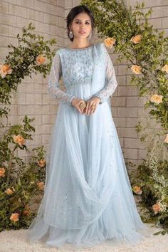 Ice blue floor length tulle gown with  beads , sequin and pearl hand embroidery. This beautiful gown is perfect for wedding, aniversary and formal functions  ✨This dress can be customise in any other colour and in all size, please contact us regarding any changes if you want.We will make this dress as per your choice. ✨We use high quality fabric and threads for embroidery.You won't face any problem in future regarding fading of colour or anything. You can use this outfit for many years.  ✨There may be slight colour difference due to high quality camera resolution and other filters. Rest every thing will be same.  🌸Care Instructions Dry clean only Elegant Tulle Long Gown, Organza Ball Gown For Prom Floor-length, Hand Embellished Floor-length Gown For Reception, Tulle Floor-length Gown For Debutante Ball, Sheer Bodice Floor-length Dress For Prom, Hand Embellished Maxi Evening Dress For Reception, Floor-length Tulle Gown For Debutante Ball, Hand Embellished Maxi Length Evening Dress For Reception, Hand Embellished Maxi Wedding Gown