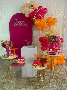 an assortment of balloons and vases on tables