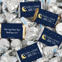 some herspooos are wrapped in foil and have the words twinkle twinkle little star on them