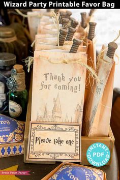 there are many bags that have been placed on top of the table for guests to sign