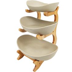 three tiered dish rack with two bowls on each shelf