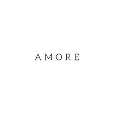 the word amore written in black ink on a white background