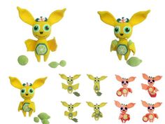 a group of small toy animals with big eyes and ears, all in different colors