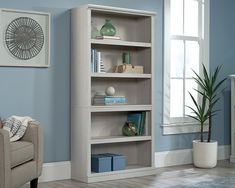 a wooden bookcase in a living room