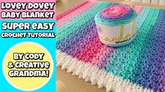 a crocheted blanket with a jar of yarn on it and the words lovey dovey baby blanket super easy crochet