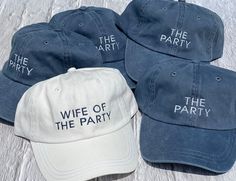 five hats with the words wife of the party printed on them