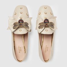 Shop the Leather ballet flat with bow by Gucci. The point toe ballet flat pump is embellished with an oversize leather bow with center bee detail. The bee—encrusted with pearl effect studs and enamel details that reflect the Web stripe—was first introduced by Gucci in the 1970s. Loafers Gucci, Gucci Flats, Studded Ballet Flats, Moccasins Women, Leather Loafers Women, Giuseppe Zanotti Heels, Gucci Leather, Pointed Toe Flats, Leather Ballet Flats