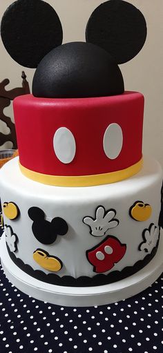 a mickey mouse cake on top of a table