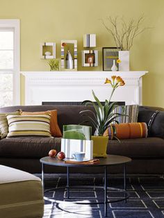 a living room filled with furniture and a fire place